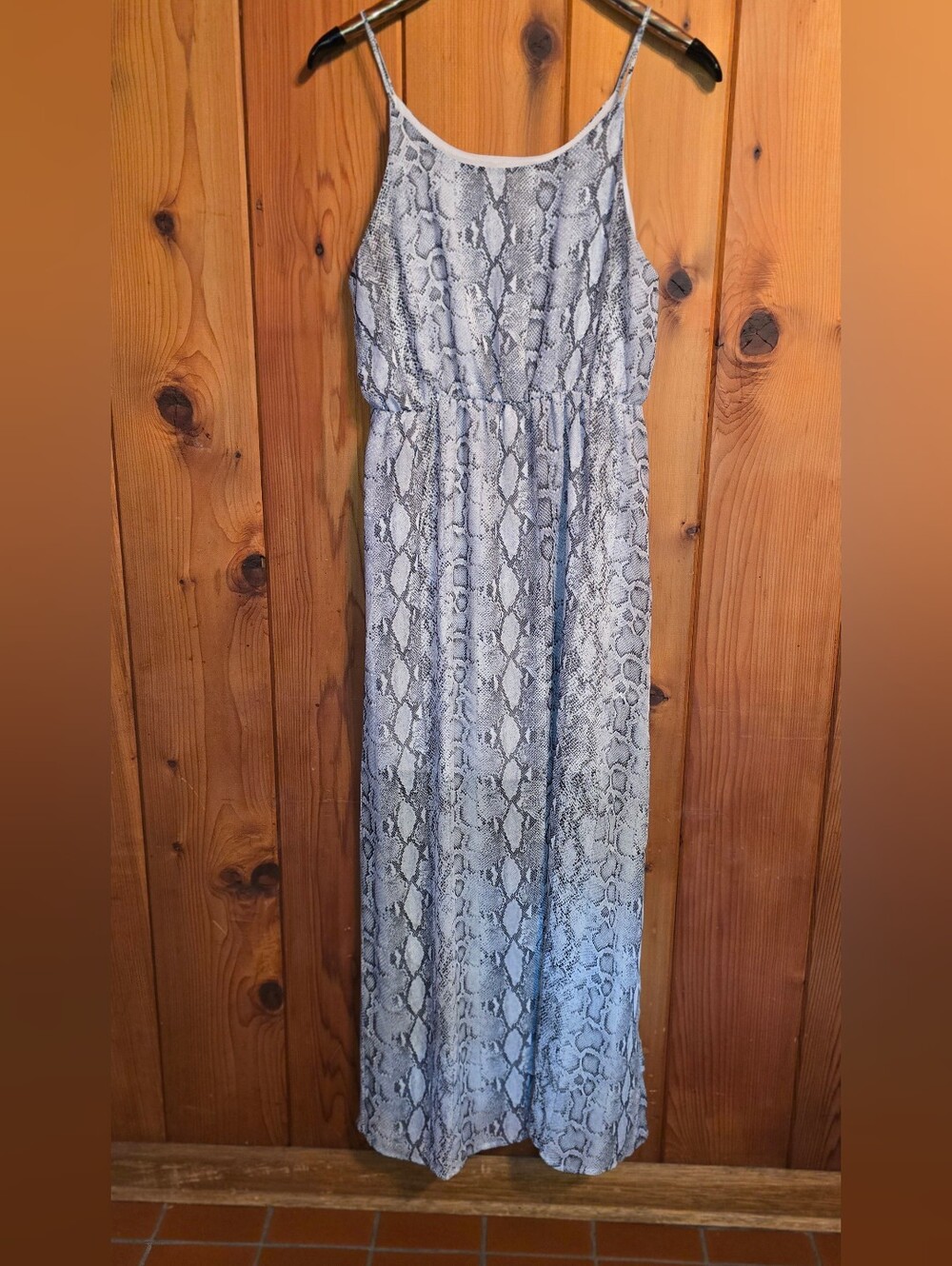 MTS brand maxi dress features a snakeskin print, spaghetti straps, and side slit